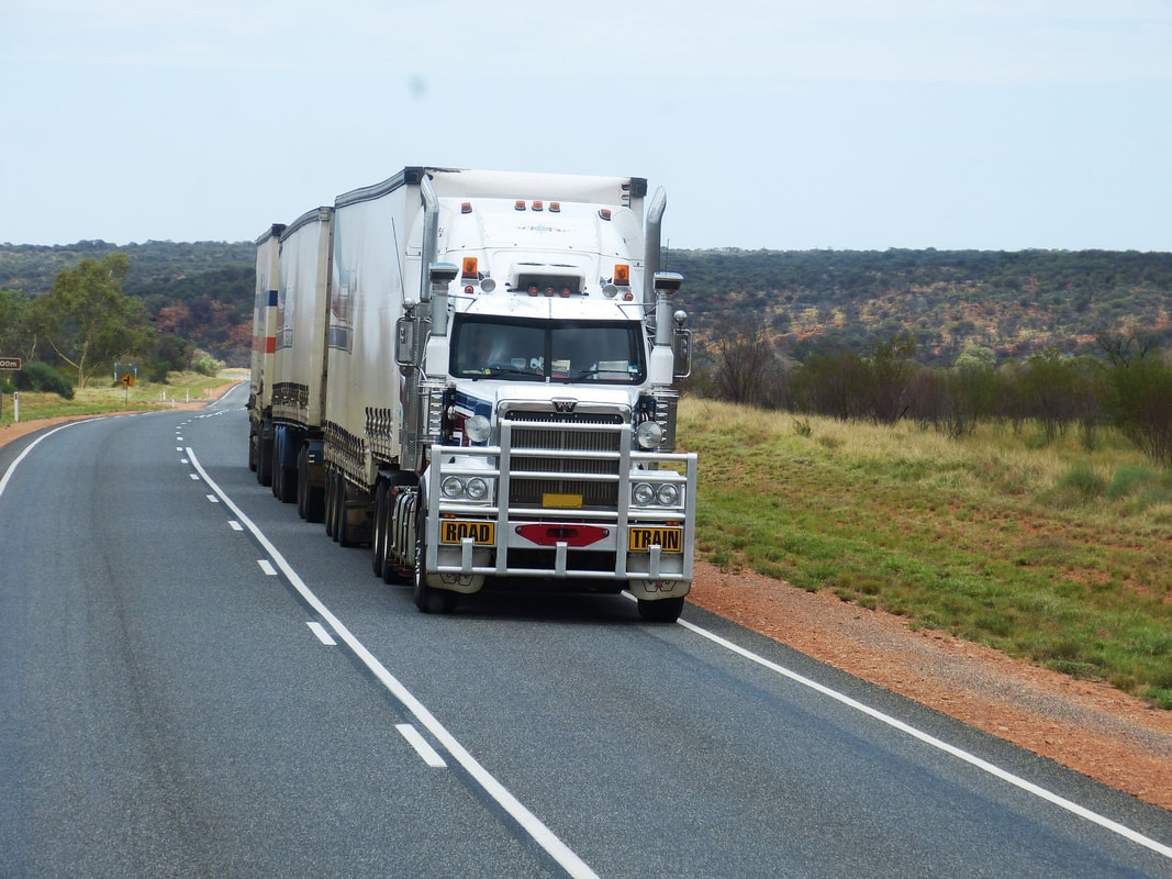 Freight transport, multiple dry vans pulled by one semi tractor. Logi Transports 