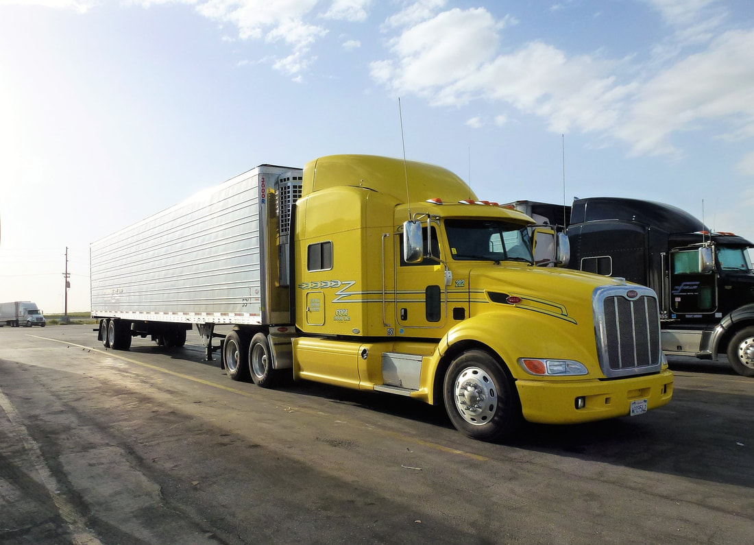 Freight transport, dry van transport, reefer trailer loaded by Logi Transports