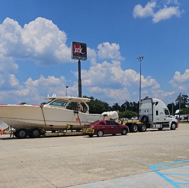 Heavy equipment transport, machinery transport via 5 axle RGN trailer by Logi Transports.