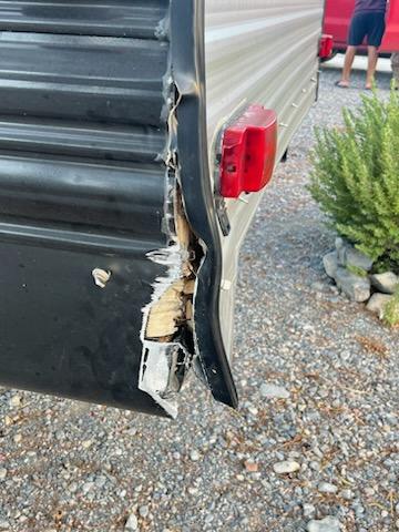 Travel trailer with damaged corner. 